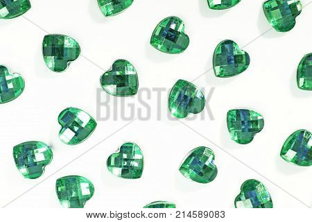 Rhinestone background. Heart shape texture as backdrop isolated white studio photo. Bling rhinestone crystal pattern. Rhinestones crystals as background.