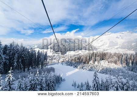 View from gondola lift to small city Werfenweng and Tennen mountains in Salzburg Austria