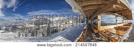 View from hut on mountain in skiresort Werfenweng to winter wonderland and Tennen mountains in Salzburg Austria