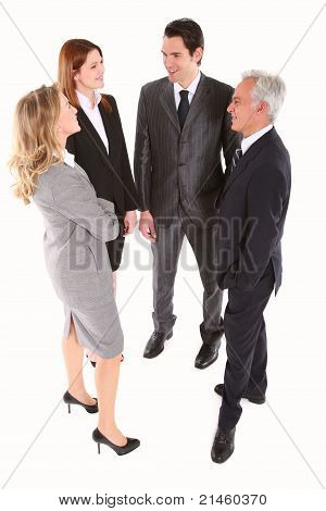 businessman and businesswoman standing chatting in white background