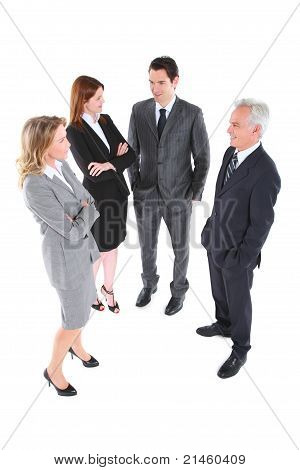 businessman and businesswoman standing chatting in white background