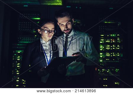 Man And Woman In Data Centre