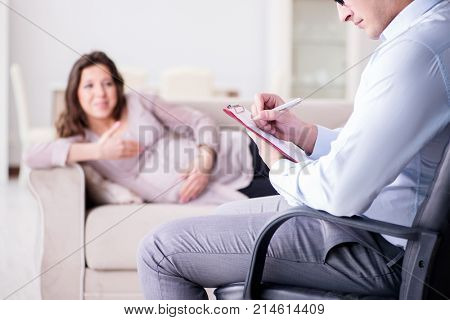 Pregnant woman visiting psychologist doctor