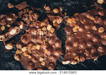 Milk Chocolate With Nuts And Nougat Pieces