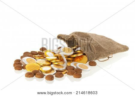Bag with Dutch ginger nuts and chocolate coins for typical Sinterklaas holidays