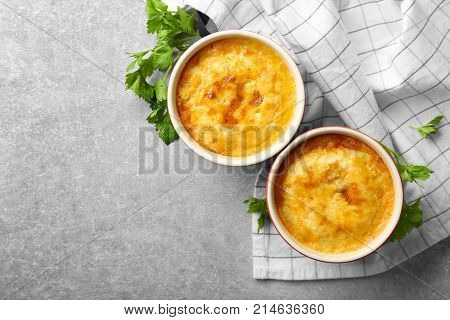 Ramekins with corn pudding on table