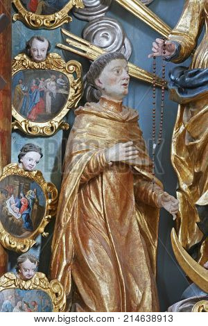 BELEC, CROATIA - NOVEMBER 17: Saint Dominic statue on the altar in the Baroque Church of Our Lady of the Snow in Belec, Croatia on November 17, 2011.