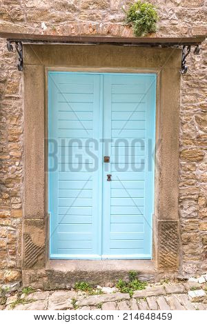 Blue Entrance Door To A House On Stone Street In Istria, Croatia