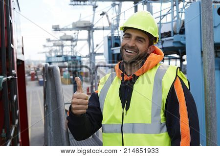 Docker smiling with thumbs up to camera