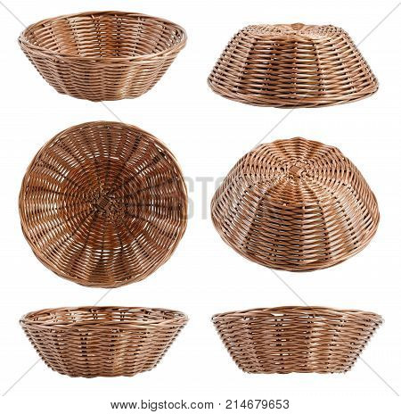 Empty brown wicker baskets at different angles isolated on white background