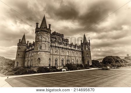 INVERARAY, SCOTLAND, UNITED KINGDOM - SEPTEMBER 8, 2015 : Inveraray Castle in western Scotland, on the shore of Loch Fyne. Vintage black and white processed.