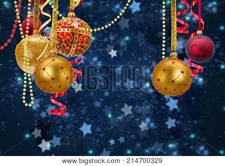 Red and golden christmas balls garlands on blue winter background