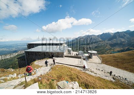 KASPROWY WIERCH POLAND-SEPTEMBER 18: Cable car carries passengers from Zakopane to Kasprowy Wierch peak on Septomer 18 2017 in Zakopane Poland. This cable car built in 1936 was the first of its kind in Poland