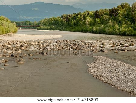 River Bregenzer Ache With Mountains In The Background In Summer