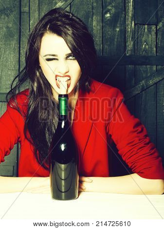 Woman Opening Wine Bottle