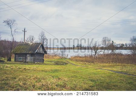 Old Wooden Bath On The Lake Shore
