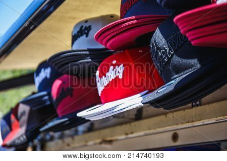 Saint Petersburg, Russia - Circa June 2017: Caps or SnapBack hats with the inscription St. Petersburg in street gift shop