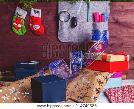 Package Christmas Gift Box. New Year Christmas Wrapping Paper, Ribbon, Bow And Thread, Scissors, Chr