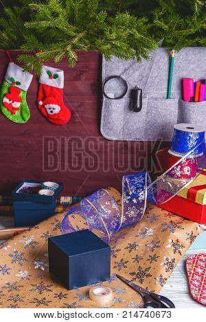 Package Christmas Gift Box. New Year Christmas Wrapping Paper, Ribbon, Bow And Thread, Scissors, Chr