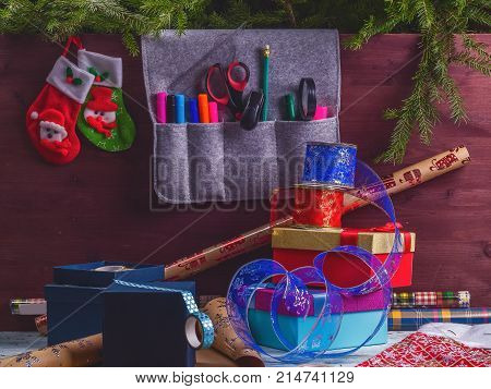 Package Christmas Gift Box. New Year Christmas Wrapping Paper, Ribbon, Bow And Thread, Scissors, Chr