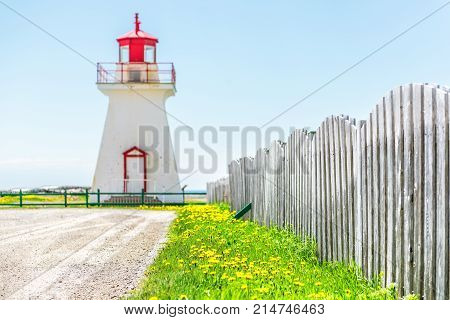 Bonaventure Village Pointe Lighthouse In Quebec, Canada Gaspesie Region With Red And White Painted C