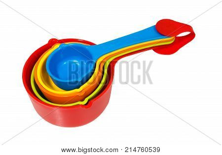Stack Of Five Ingredient Measuring Spoon In Set With Red Clip For Holding The Spoons Together Isolat