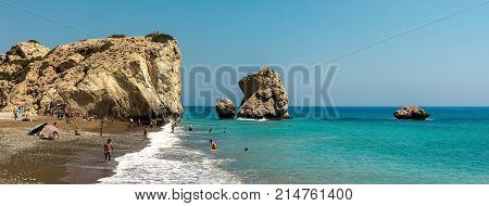 Aphrodite's Rock, Cyprus, July 2017: Tourists visiting Aphrodite Rock and swimming on a beach between Limassol and Paphos