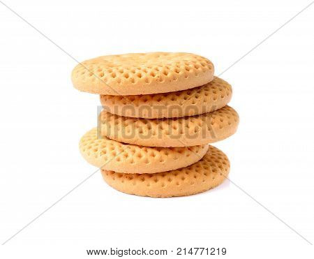 Biscuits A stack of delicious wheat round biscuits with a few crumbs isolated on white Fresh cookies Dry cracker cookies isolated