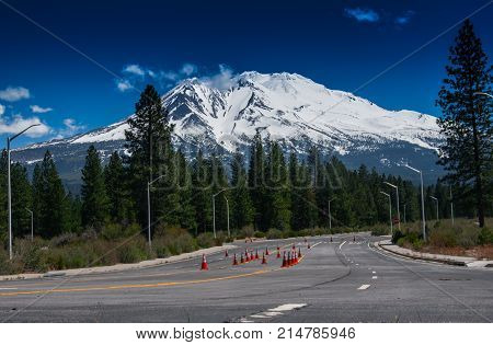 beautiful view of the snow-covered mountain from the warm road