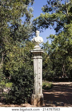 OEIRAS, PORTUGAL - September 17, 2017: Bust statues of poets philosophers and writers decorating the gardens of the Palace of Marques de Pombal in Oeiras Portugal