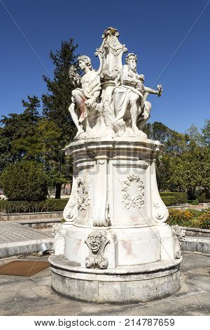 OEIRAS, PORTUGAL - September 17, 2017: Sculpture of the Four Seasons Fountain in the middle of the vegetable garden of the Palace of Marques Oeiras Portugal