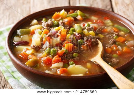 Homemade Soup With Ground Beef And Vegetable Mix Close-up In A Bowl. Horizontal