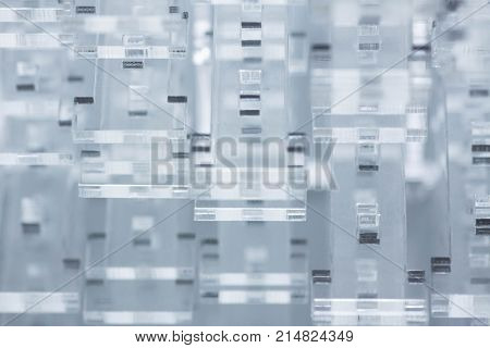 Abstract high-tech background. Details of transparent plastic or glass. Laser cutting of plexiglass.
