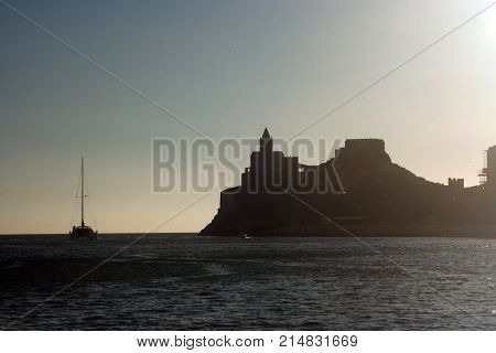 Back boats in the sea in front of Portovenere