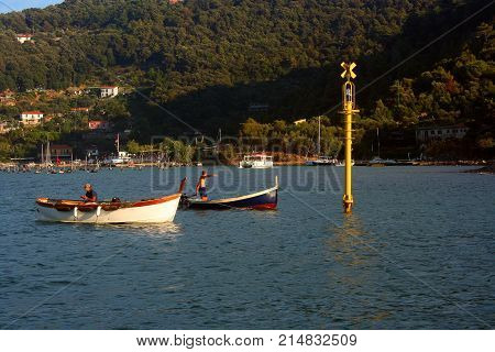 Two fishing boats in front of Palmaria Island