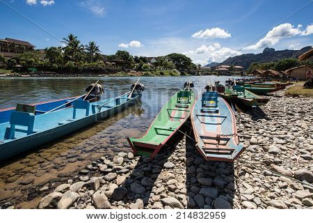 long boat in Song river at Vang Vieng Laos
