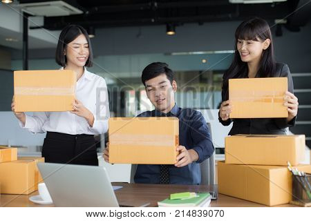 Young Asian Woman Holding Box With Smiling Together, Young Owner Woman Start Up For Business Online,