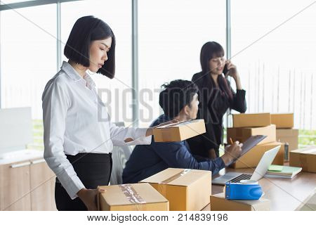Young Asian Woman Holding Box With Smiling Together, Young Owner Woman Start Up For Business Online,