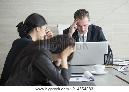 Business People Working Together With Serious Emotion. Business People Have Stress Situation When Me