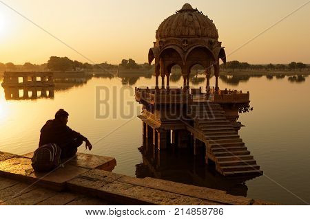 Jaisalmer, India, November 2, 2017 : A Man At Sunrise On Gadsisar Lake In Jaisalmer