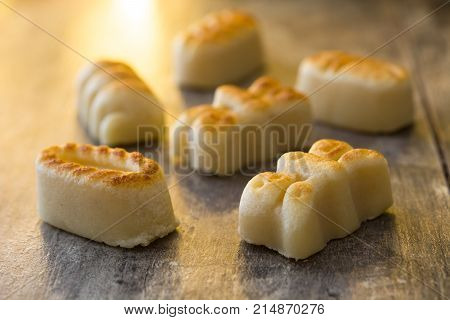 Christmas marzipan sweets on wooden table. Typical spanish christmas dessert