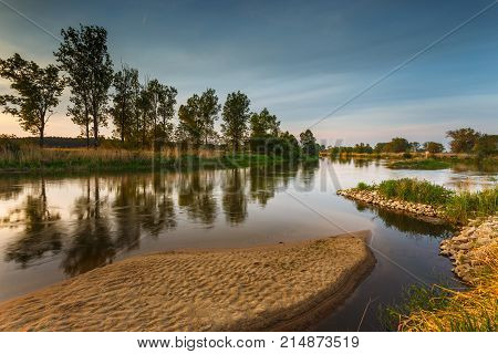 Warm Sunset Over Warta River In Warta Landscape Park, Poland.