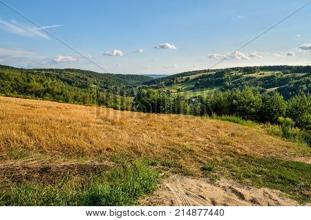 Rural summer landscape. A village in a beautiful Jurassic valley in Poland.