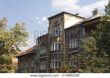 SARAJEVO, BOSNIA AND HERZEGOVINA - AUGUST 19 2017: very ruined building facade in Sarajevo after the war