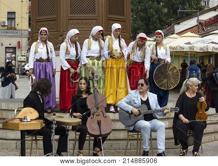 SARAJEVO, BOSNIA AND HERZEGOVINA - AUGUST 17 2017: Group of bosnian musician in front of sebilj fountain traditionally dressed