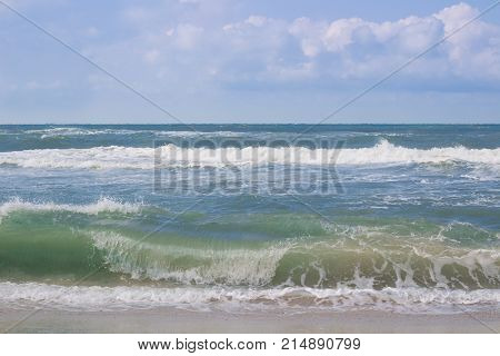 Sea Coast Waves Rolling On Empty Sandy Beach, Stormy Sunrise