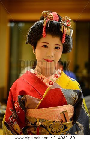 Young Geisha Performing At Local Restaurant