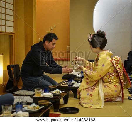 Young Geisha Performing At Local Restaurant