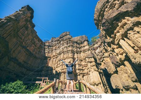 Young Asian Woman Traveler Travelling To Wonderful Soil Cliff Pha Cho At Mae Wang National Park, Doi