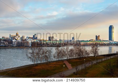 View of Iset river embankment on sunset. Yekaterinburg. The Urals. Russia